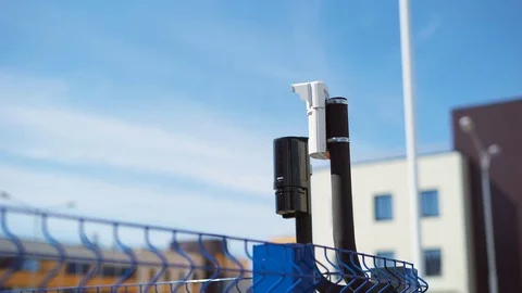 System of video surveillance and motion sensors are located on the corner of the Stock-Footage 70513253