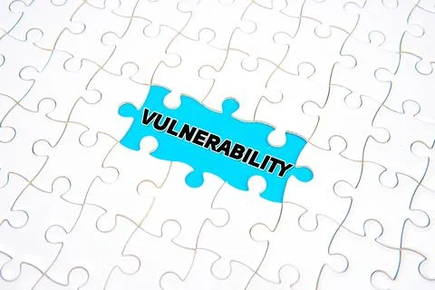 System vulnerability concept with missing puzzle piece on blue background Stock Photos