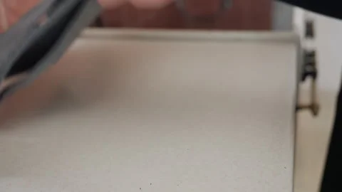 Systematic preparation of towels before packing in new residence. Carefully Stock Footage 337229389