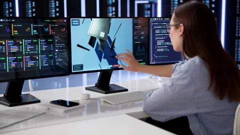 Systems Engineer Efficiently Monitors Servers Stock Footage 333399563