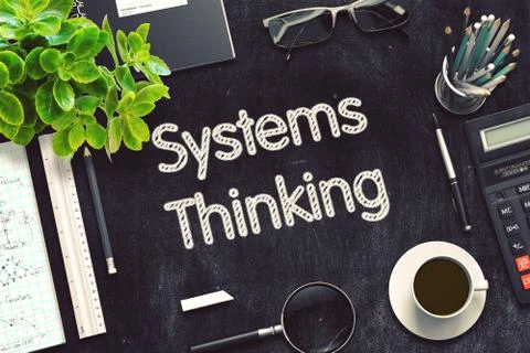 Systems Thinking on Black Chalkboard. 3D Rendering Stock Illustration