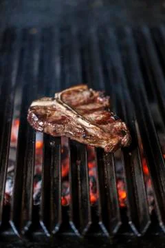 T-bone on the BBQ Stock Photos