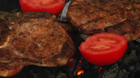T-Bone Grilled Steak Being Flame Grilled on a Barbecue Video stock 40256639