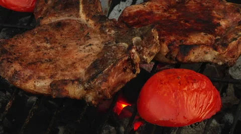T-Bone Grilled Steak Being Flame Grilled on a Barbecue Video stock 40256649