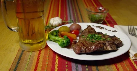T-Bone Or Porterhouse Steak Dinner Served With Vegetables 50 Stock Footage 84004093