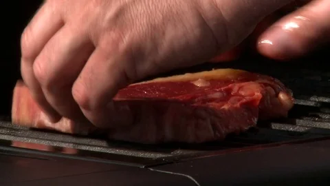T-Bone put on the BBQ Stock Footage 85315524