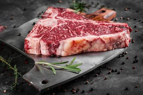 T-Bone steak marble, raw meat steak beef with rosemary Stock Photos
