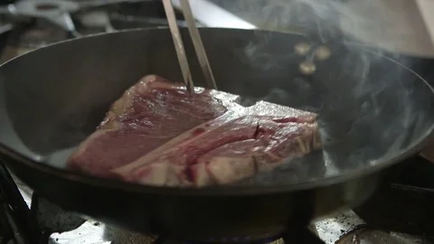T bone steak meat fried on pan Video stock 72275533