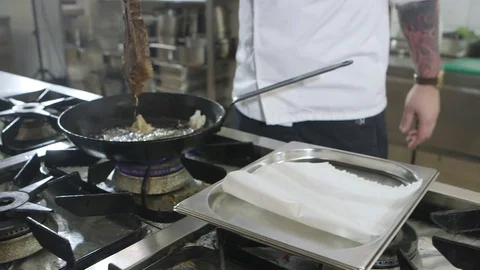 T bone steak out of the frying pan Stock Footage 72275988