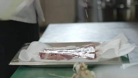 T bone steak rubbed with oil Stock-Footage 72275291