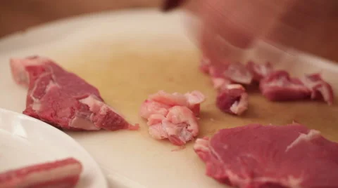 T-bone steak - slicing meat onto chunks Stock Footage 45048014