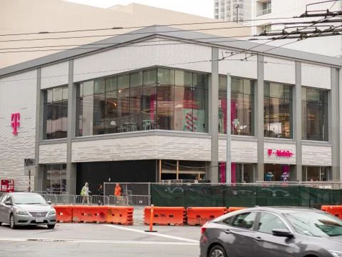 T-Mobile logo on flagship store in downtown San Francisco on Market St Stock Photos