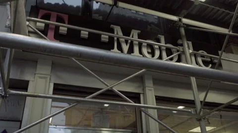 T Mobile store under scaffolding on Broadway in NoHo on gritty NYC day in 1080 Stock Footage 58911871