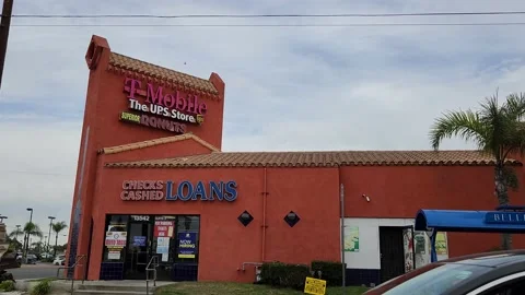 T Mobile the UPS Store Checks Cashed Loans Business Stock Footage 236652984