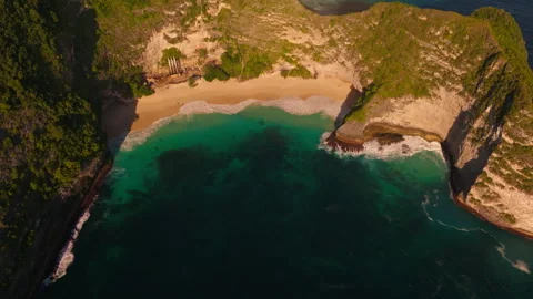 T-Rex Cliff at Kelingking Beach During Sunset Drone Shot Stock Footage 317201435