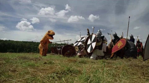 T-REX Inflatable Dinosaur Suit Vs Viking Troops Vidéo 153806643