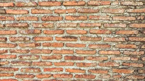 T Rough red brick wall background with copy space. Rustic and natural surfa.. Stock-Fotos