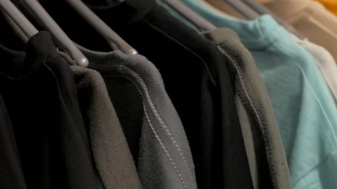 T-shirts on a hanger Stock Footage 103689268