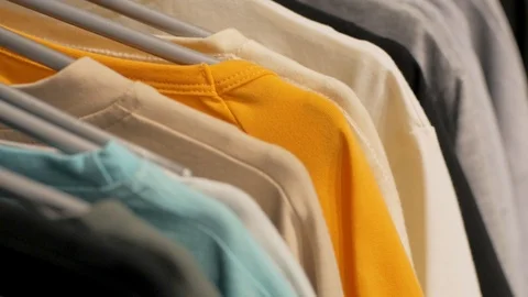 T-shirts on a hanger Stock Footage 103689334