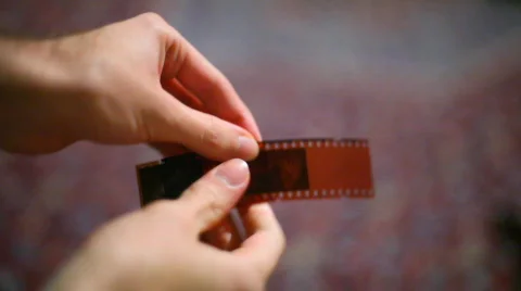 T106 handling film negative Stock Footage