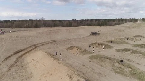 T90 tank quickly rides the sand Stock Footage 76838410