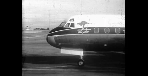 TAA Lockheed Electra Mark II on Tarmac, Australia, 1960s Video stock 338236124