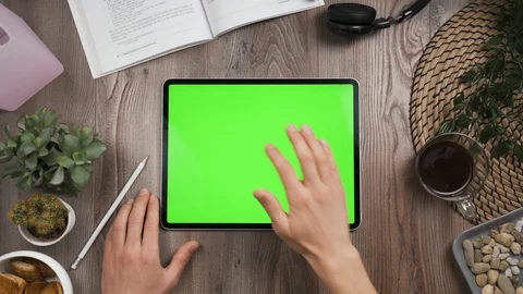 Tab with chromakey screen. Top view. Hand taps on the center then show thumb up. Stock Footage 129391048