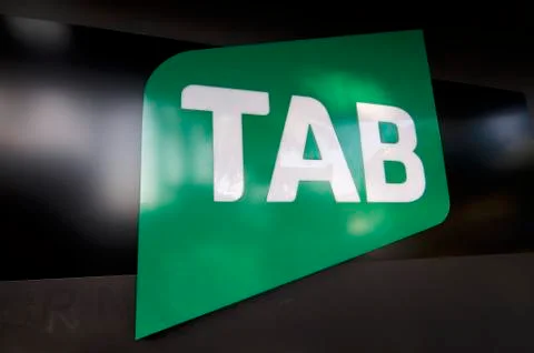 TAB logo on black wall Stock-Fotos