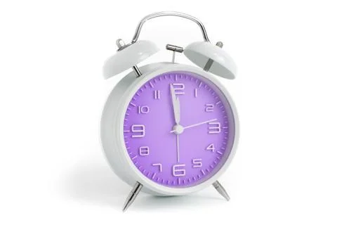 Table alarm clock with time 1 minute to 12 hours with purple clock face, 11.5 Stock Photos