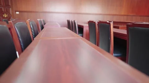 Table and chair in the courtroom of the judiciary Stock Footage