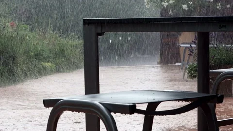 Table And Chair In Summer Under Heavy Rain Stock Footage 180504318