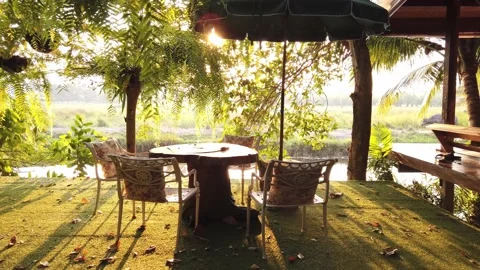 Table and chairs in garden. Stock Footage 134909749