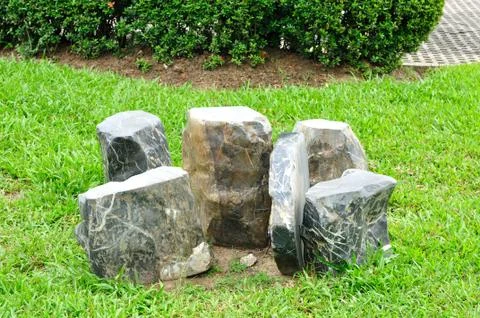 Table and chairs set made from rock. Stock Photos