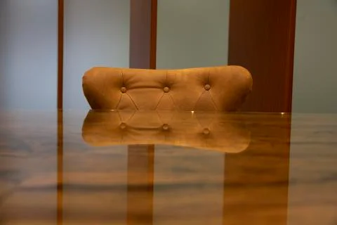 Table and leather covered Stock Photos