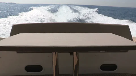 Table and sofa on running boat Stock Footage 32619235