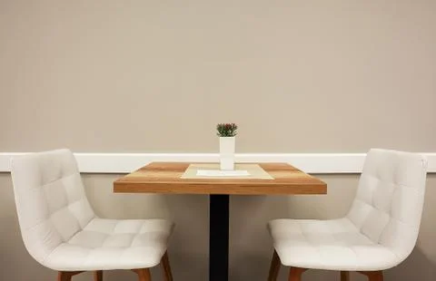 Table And Two Armchairs Stock-Fotos