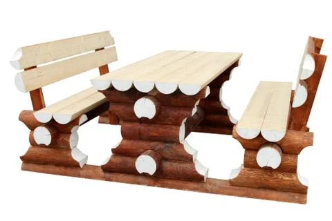 Table and two benches made of natural logs. Stock Photos