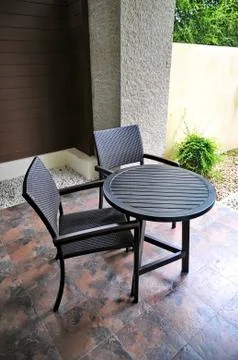 Table and two chairs Stock Photos