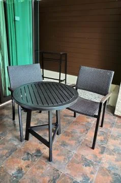 Table and two chairs Stock Photos