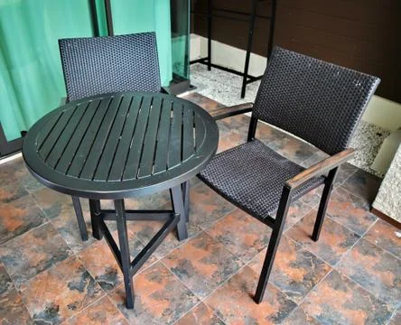 Table and two chairs Stock Photos
