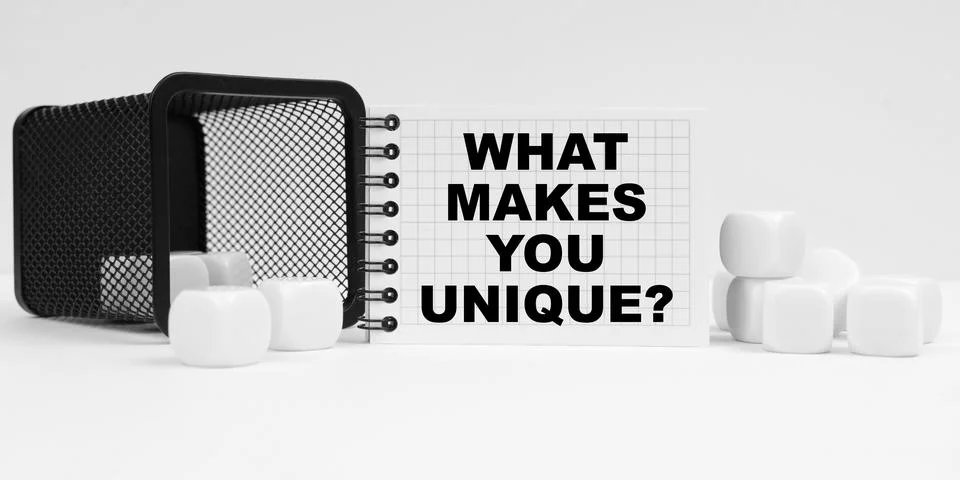On the table are cubes, a small basket and a notebook with the inscription -  Stock Photos