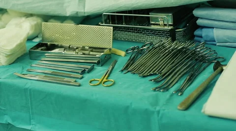 On the Table Are Lie Kit of the Disinfected Metal Tools For Surgery Video stock 68331292