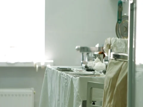 On the table are lie kit of the disinfected metal tools for surgery Video stock 81379037