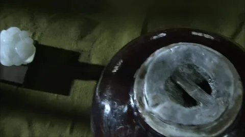 On the table are placed the Tao Te Ching and treasures Stock Footage 261641025