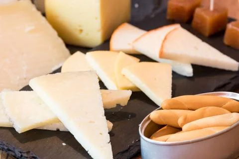 Table of assorted cheeses Stock Photos