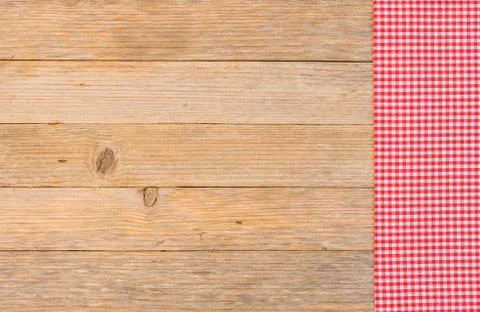 Table background with red tablecloth on rustic wood Stock Photos