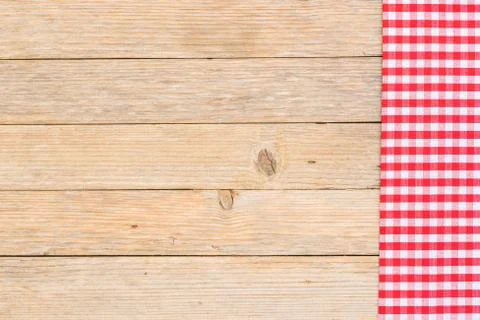 Table background with rustic red tablecloth Stock Photos