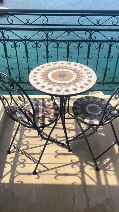 A table on a balcony over the sea. Vertical video Stock-Footage 287331872