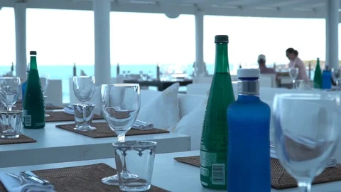 Table at a beach restaurant Stock Footage 127869484