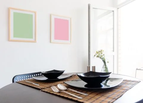 Table with black plates Stock Photos